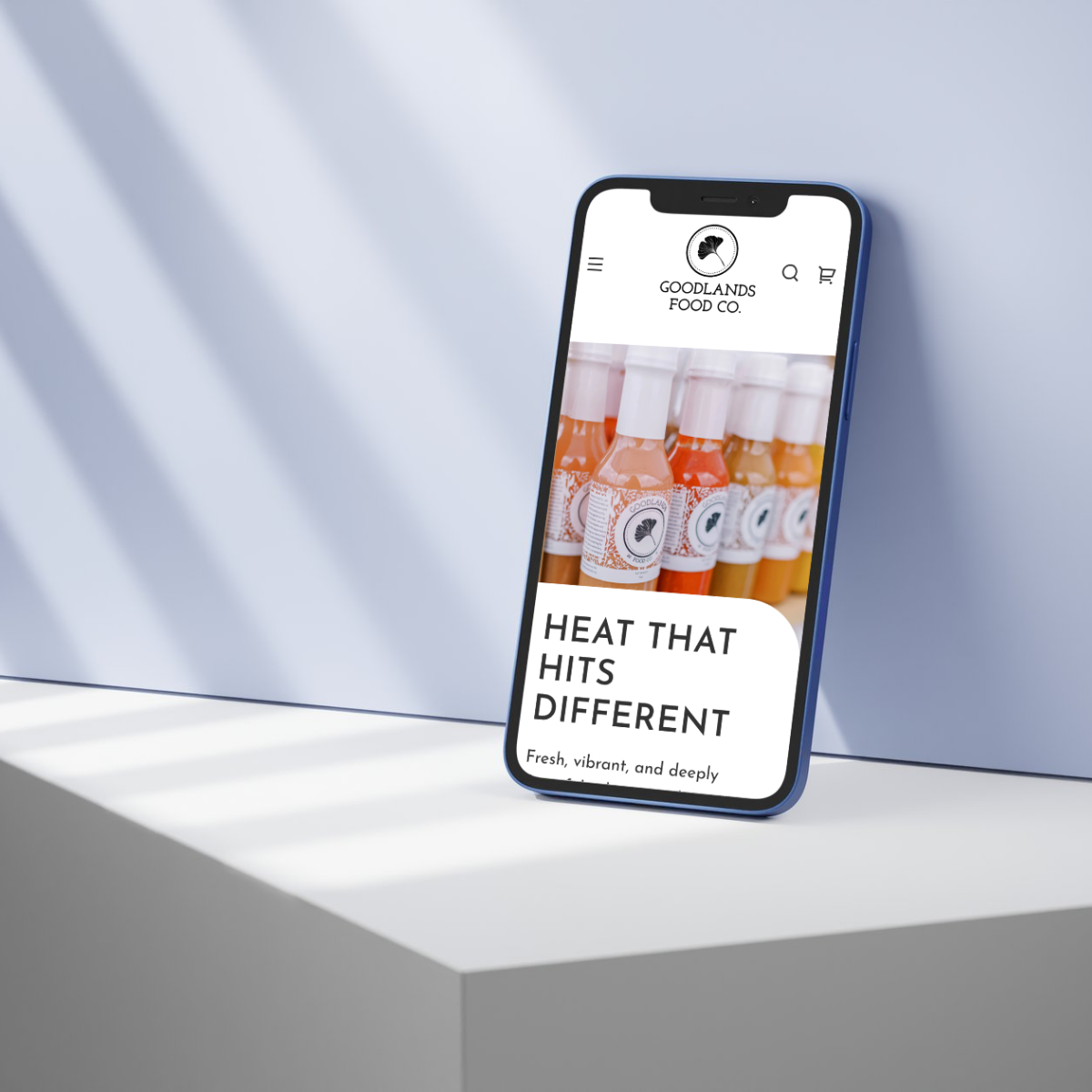 Mobile-optimized Shopify website for Goodlands Food Co., showcasing artisanal hot sauces with a bold and modern ecommerce design. Expertly crafted ecommerce website design for food brands.